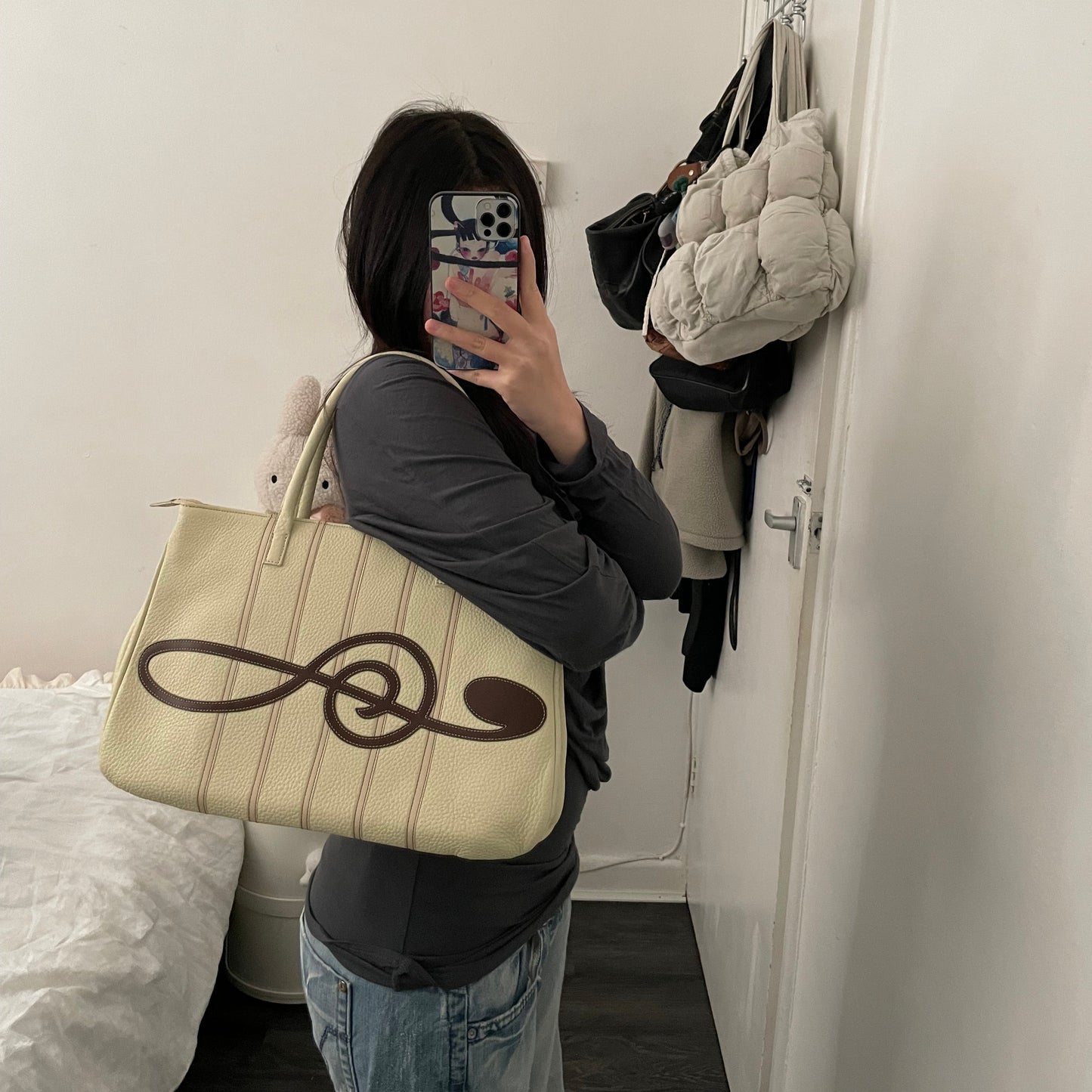 rare music for living cream leather treble note shoulder bag