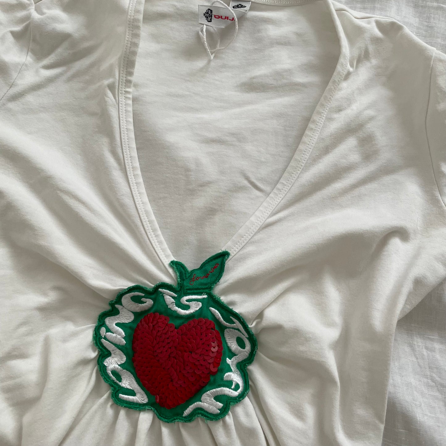 fornarina white ruched cap sleeve apple sequin top