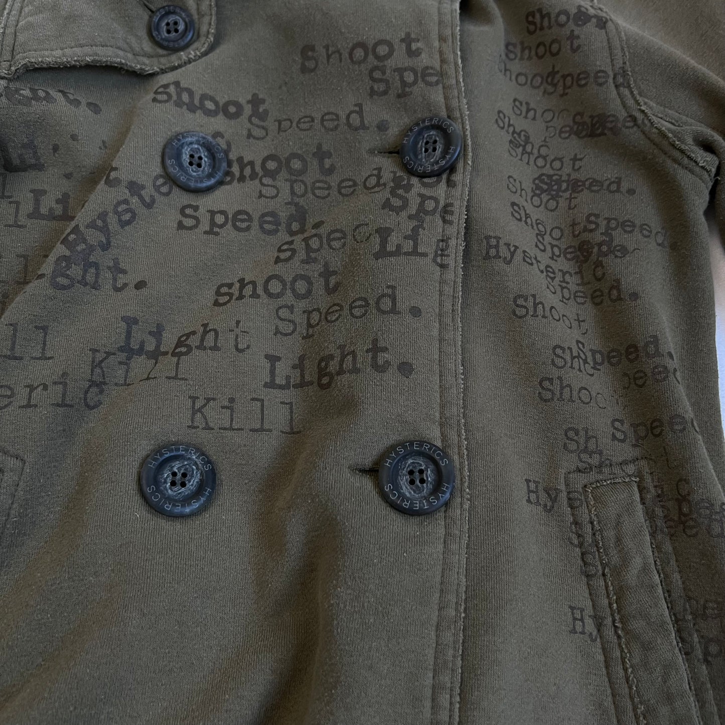 hysterics khaki corpcore asymmetric button faded text graphic collared jacket