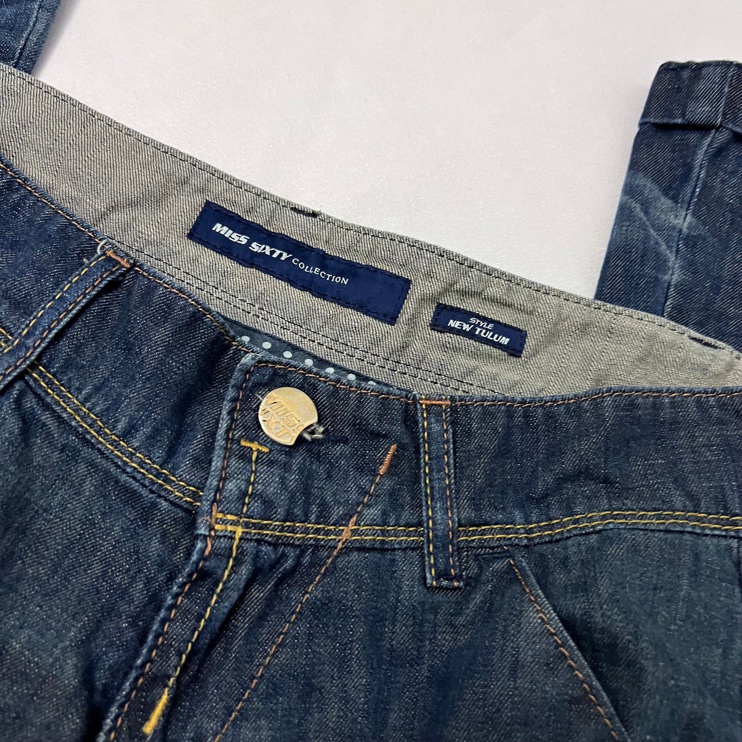 vintage miss sixty indigo wash low rise wide flared leg denim jeans