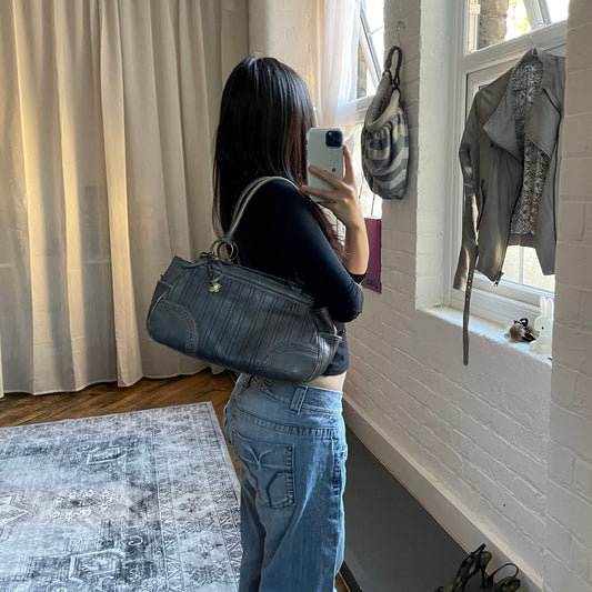 anna sui faded denim grey panelled shoulder bag with ribbon bow detail + brass hardware and butterfly charm