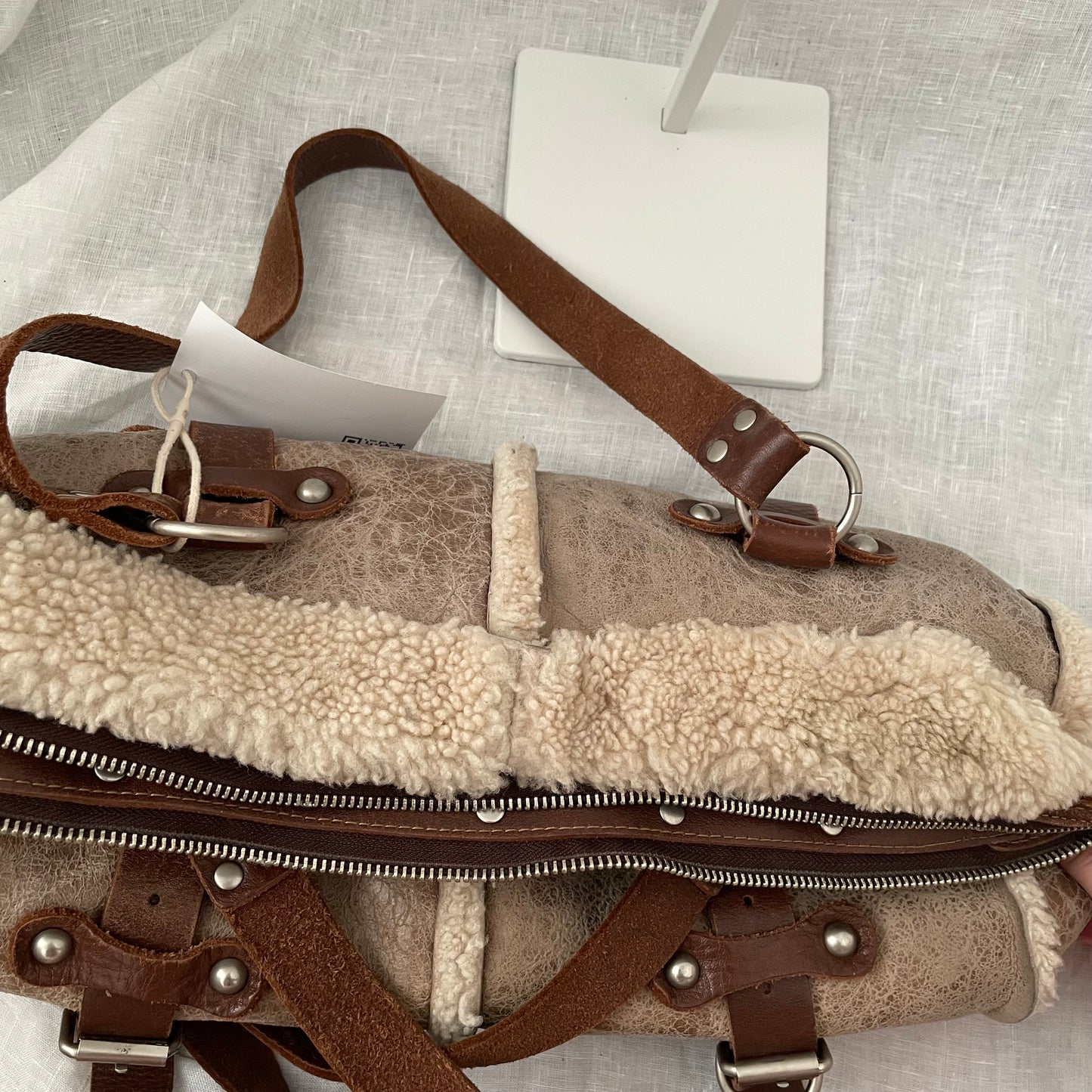 vintage dakota beige brown faded leather sherpa handbag with brown leather buckle detail