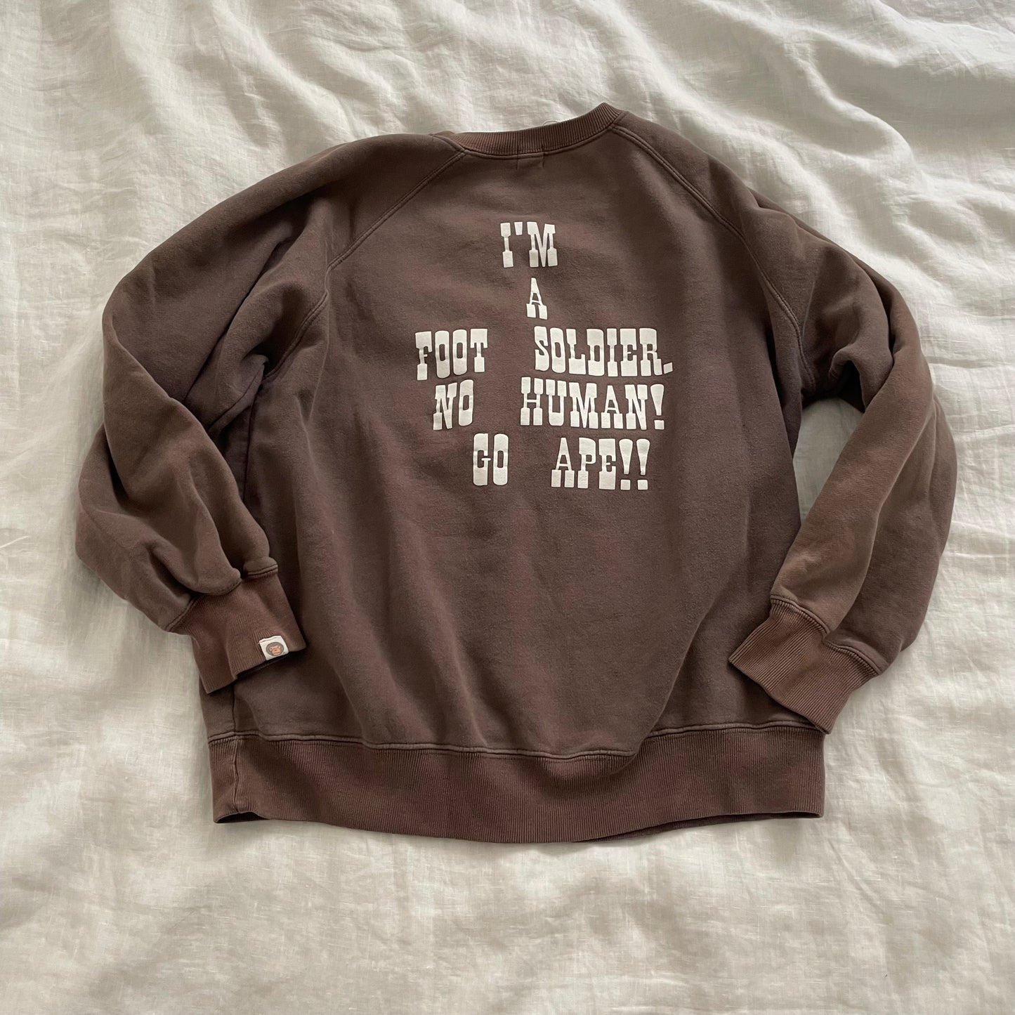 a bathing ape bape brown white western graphic text' 'foot shoulder' long sleeve crew neck jumper