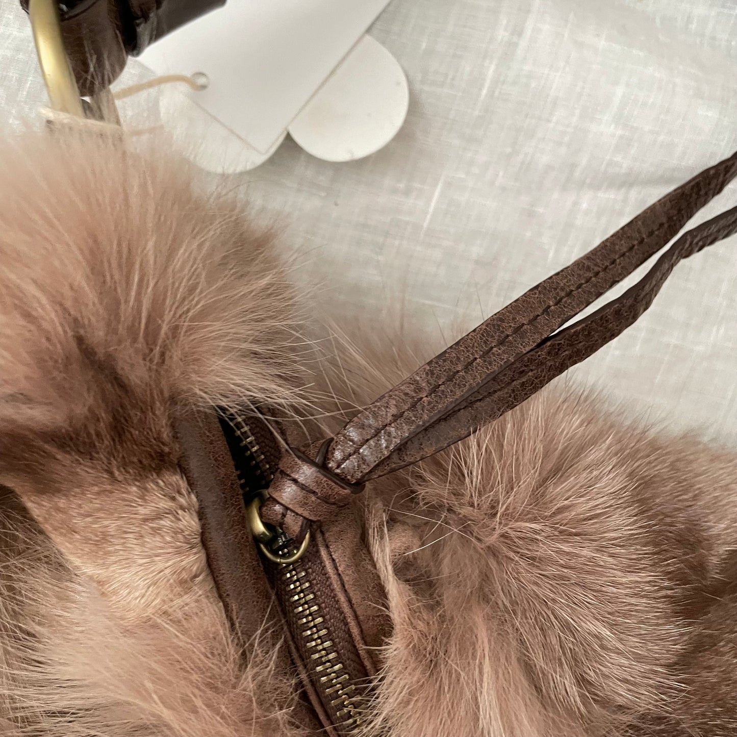 grace continental fluffy fox fur brown leather bronze grommet strap slouchy shoulder bag