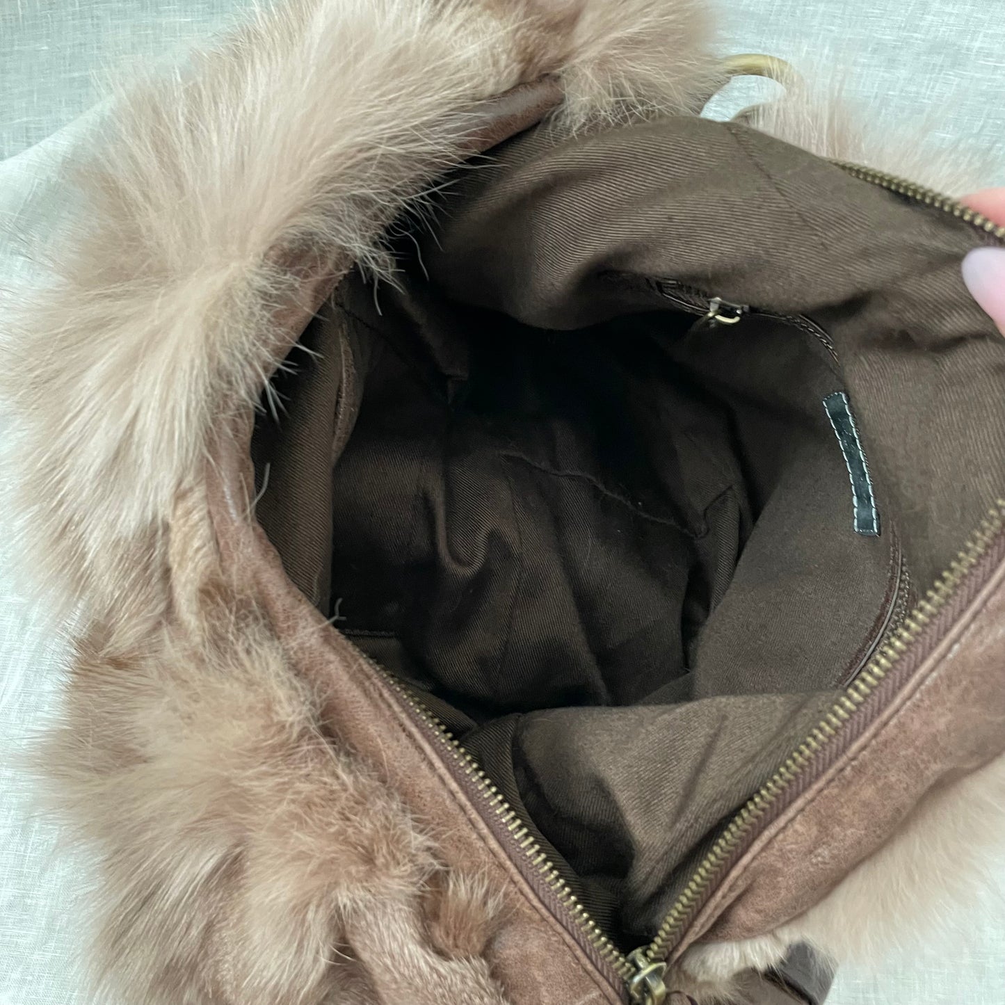 grace continental fluffy fox fur brown leather bronze grommet strap slouchy shoulder bag