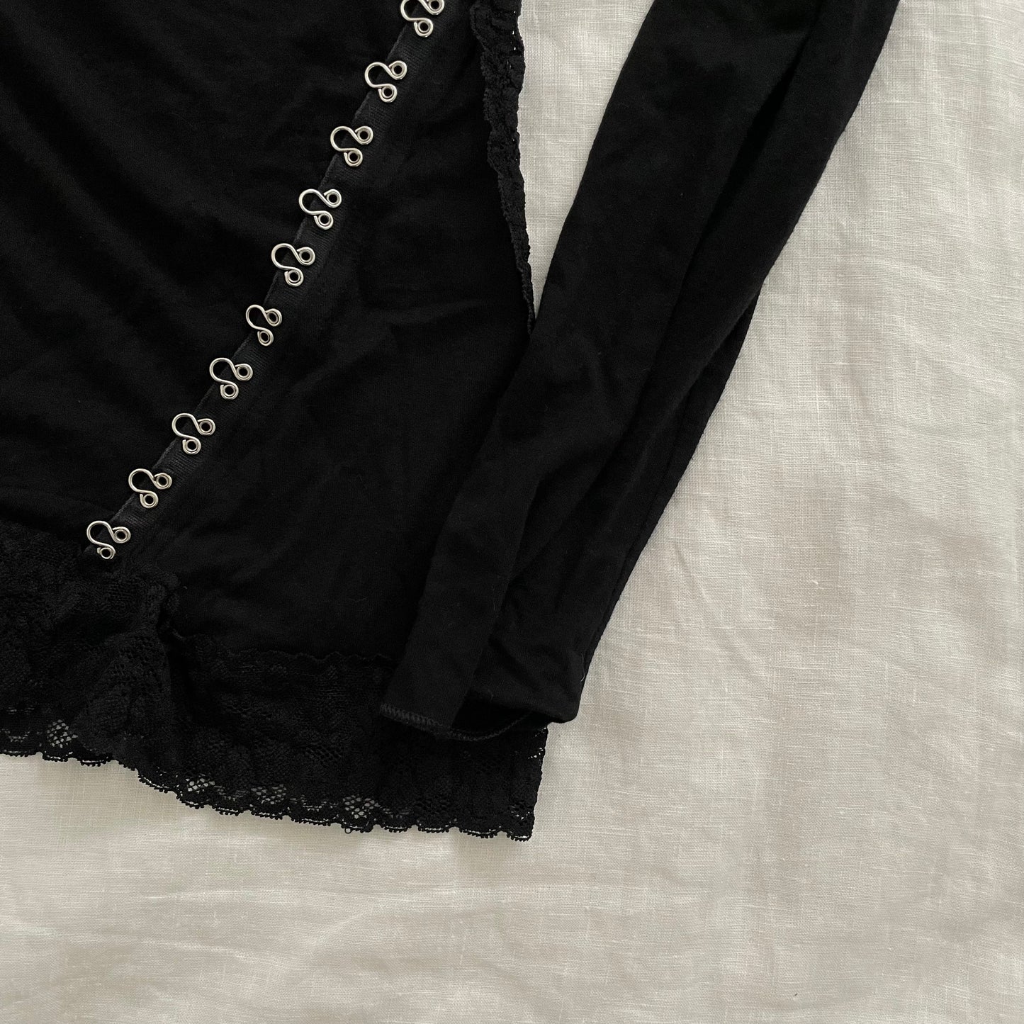 blumarine black wide neck hook and eye long sleeve graphic top