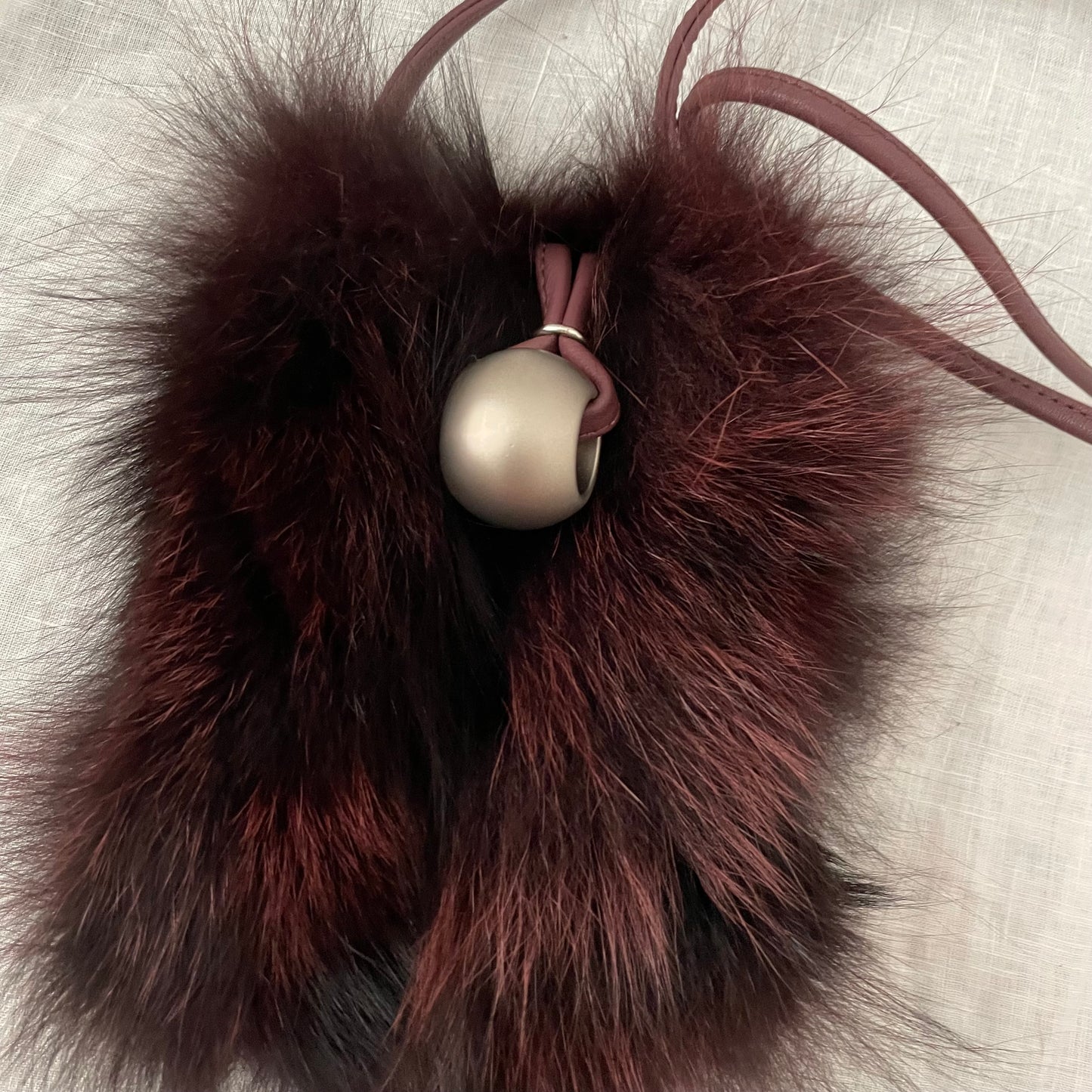 lanzetti bordeaux rouge fur x leather crossbody bag with silver bead detail