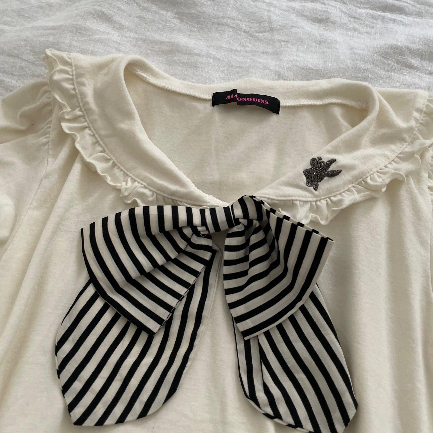 alonaquins preppy punk sailor off white puff sleeve balloon hem top with back detail and striped ribbon bow