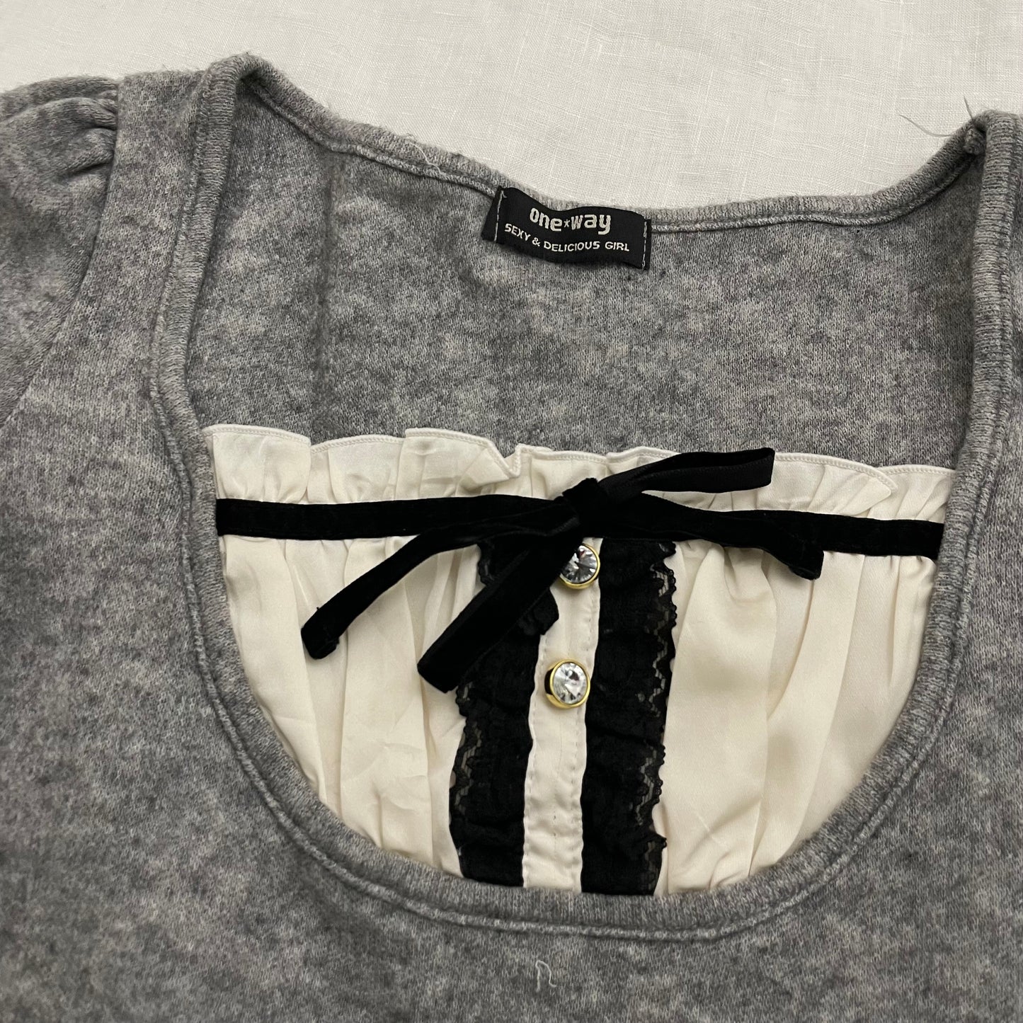 one way grey milkmaid style two in one layered knit