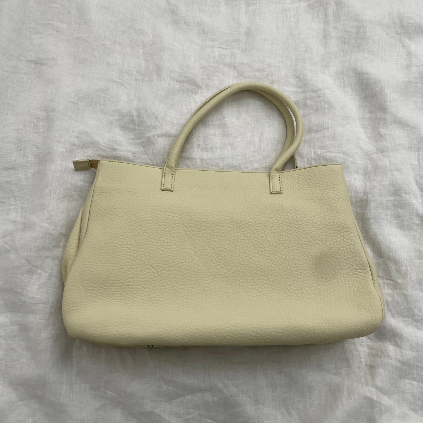 rare music for living cream leather treble note shoulder bag
