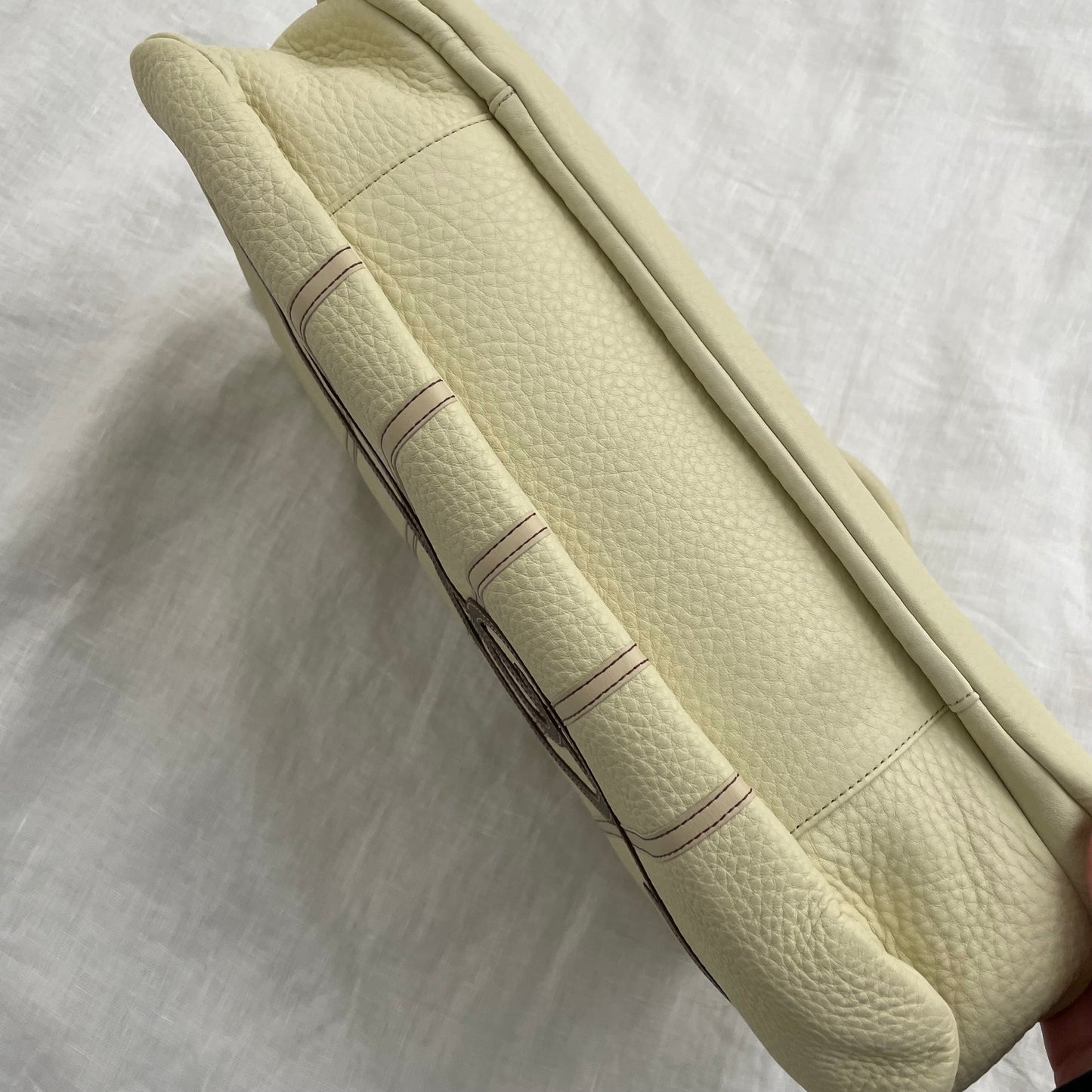 rare music for living cream leather treble note shoulder bag