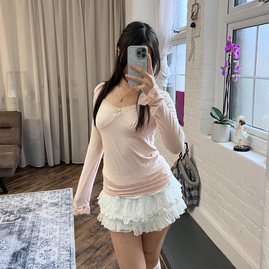 coquette angelic pink long sleeve liz lisa lacey square neck top with criss cross back detailing and frilly sleeve hem