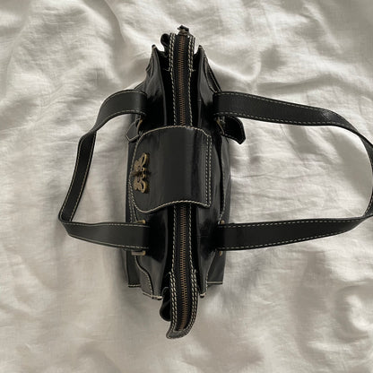 vintage anna sui black leather brassy hardware butterfly lock shoulder bag
