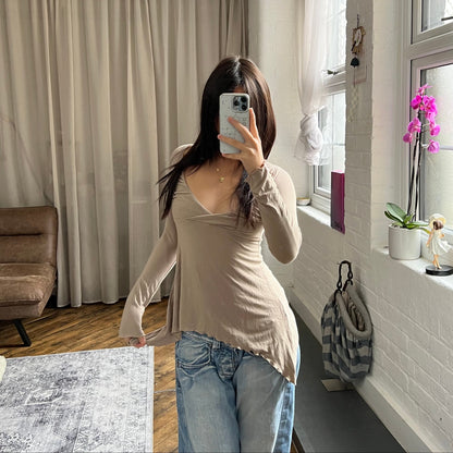 speccio beige balletcore wrap style asymmetric hem long sleeve shirt
