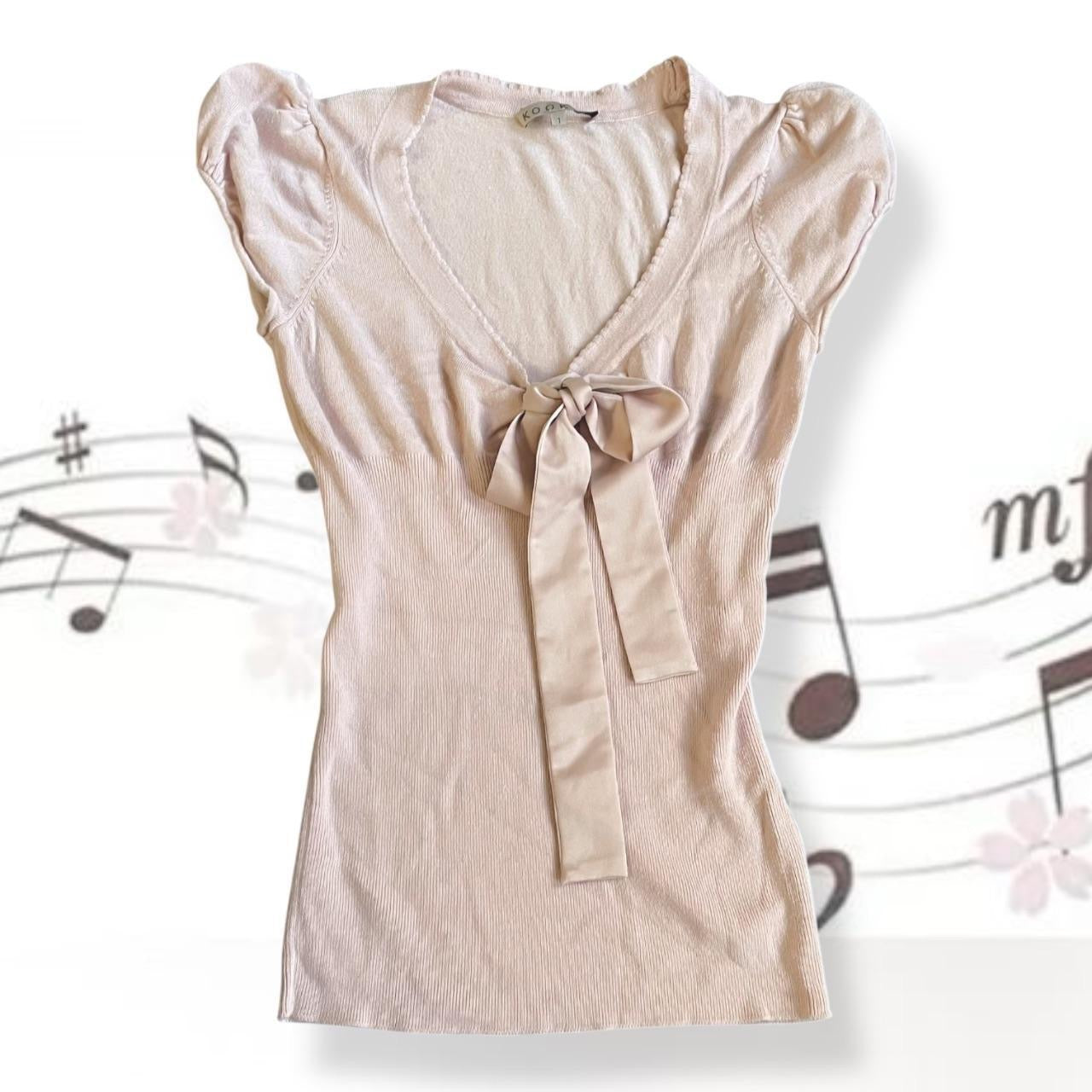 coquette balletcore kookai baby pink puff sleeve v neck fitted top with satin bust ribbon detail