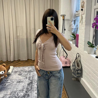 coquette balletcore kookai baby pink puff sleeve v neck fitted top with satin bust ribbon detail