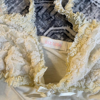 coquette cream pastel yellow lacey frilly liz lisa bow charm camisole