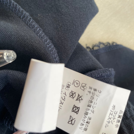 dark coquette navy pleated dual bow lacey hemline mini skirt