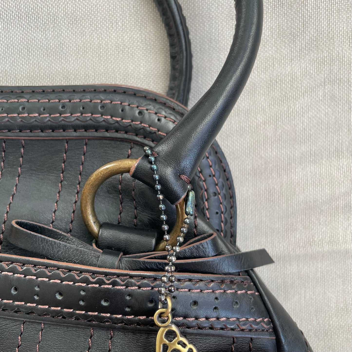 balletcore black leather anna sui panelled curved shoulder bag