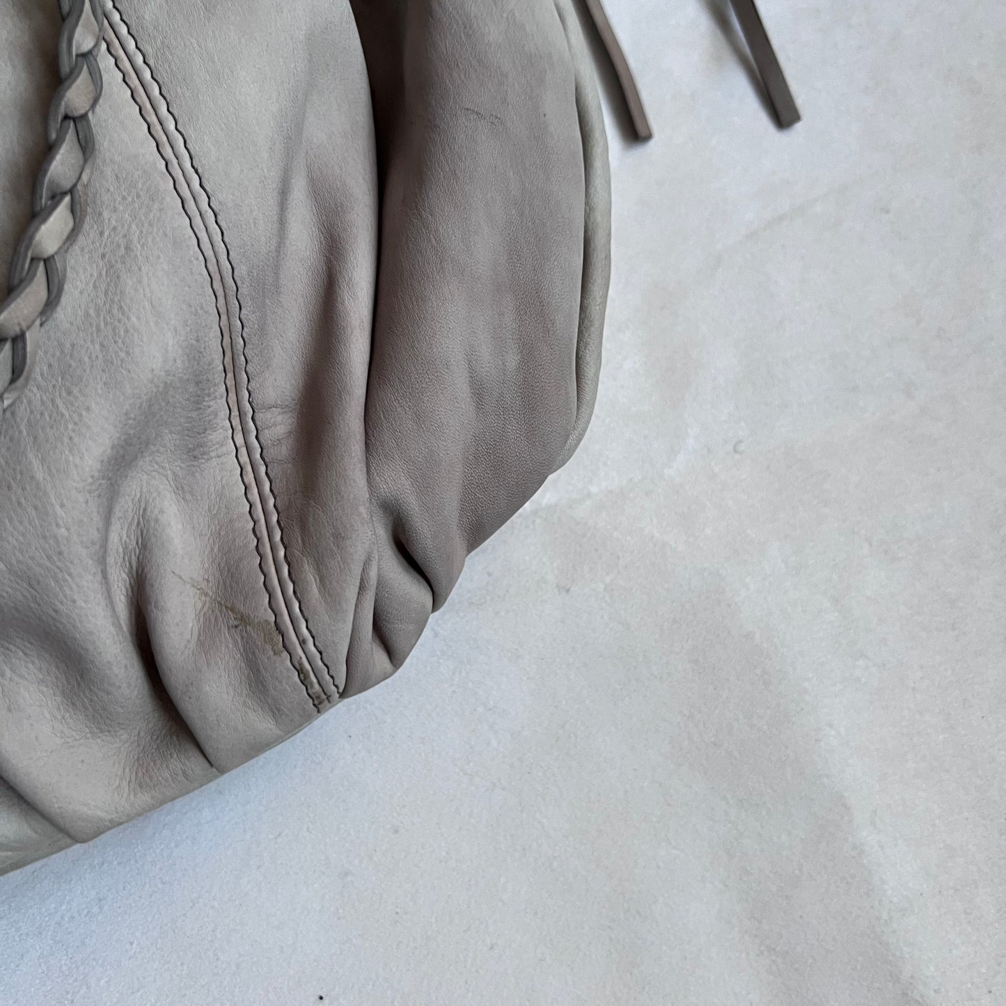 braided tassel allsaints beige stone tan faded wash oversized leather shoulder bag