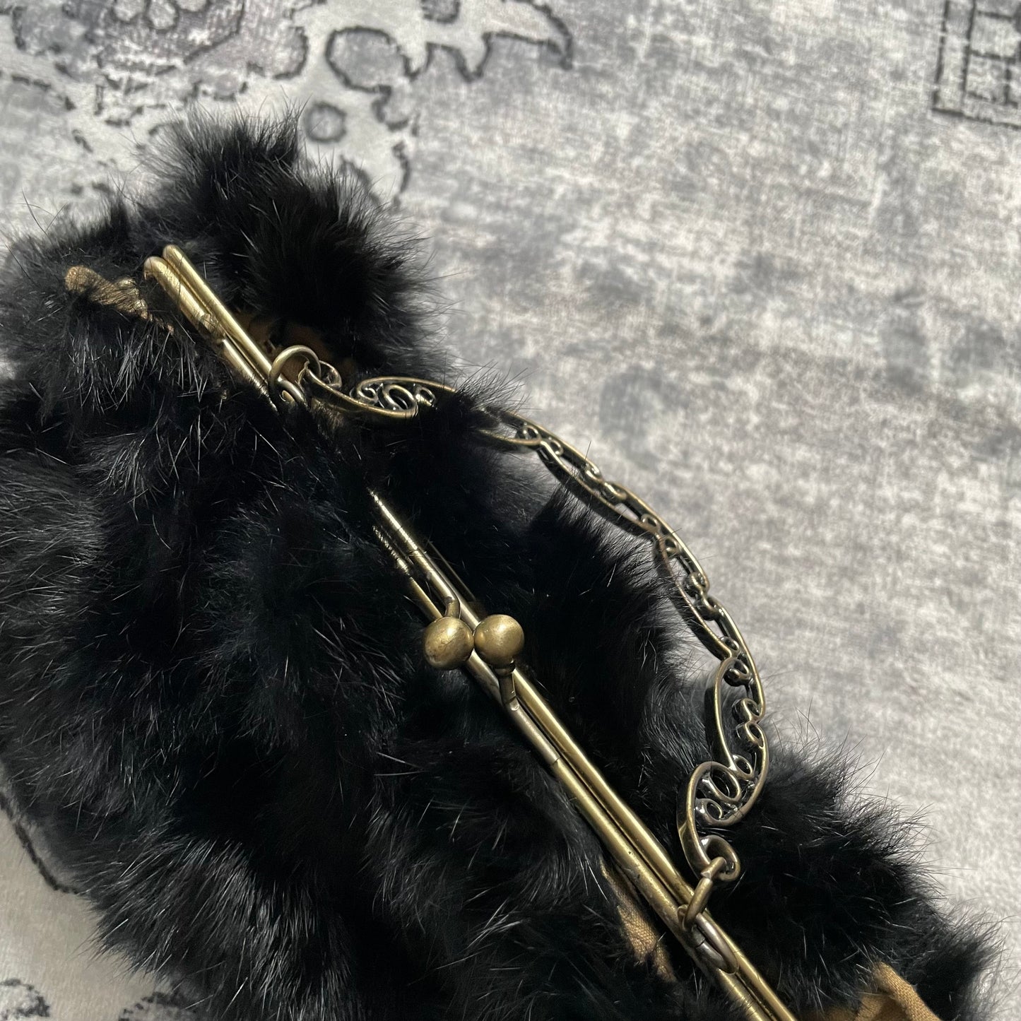 vintage black fluffy rabbit fur brassy ornamental handle clutch bag