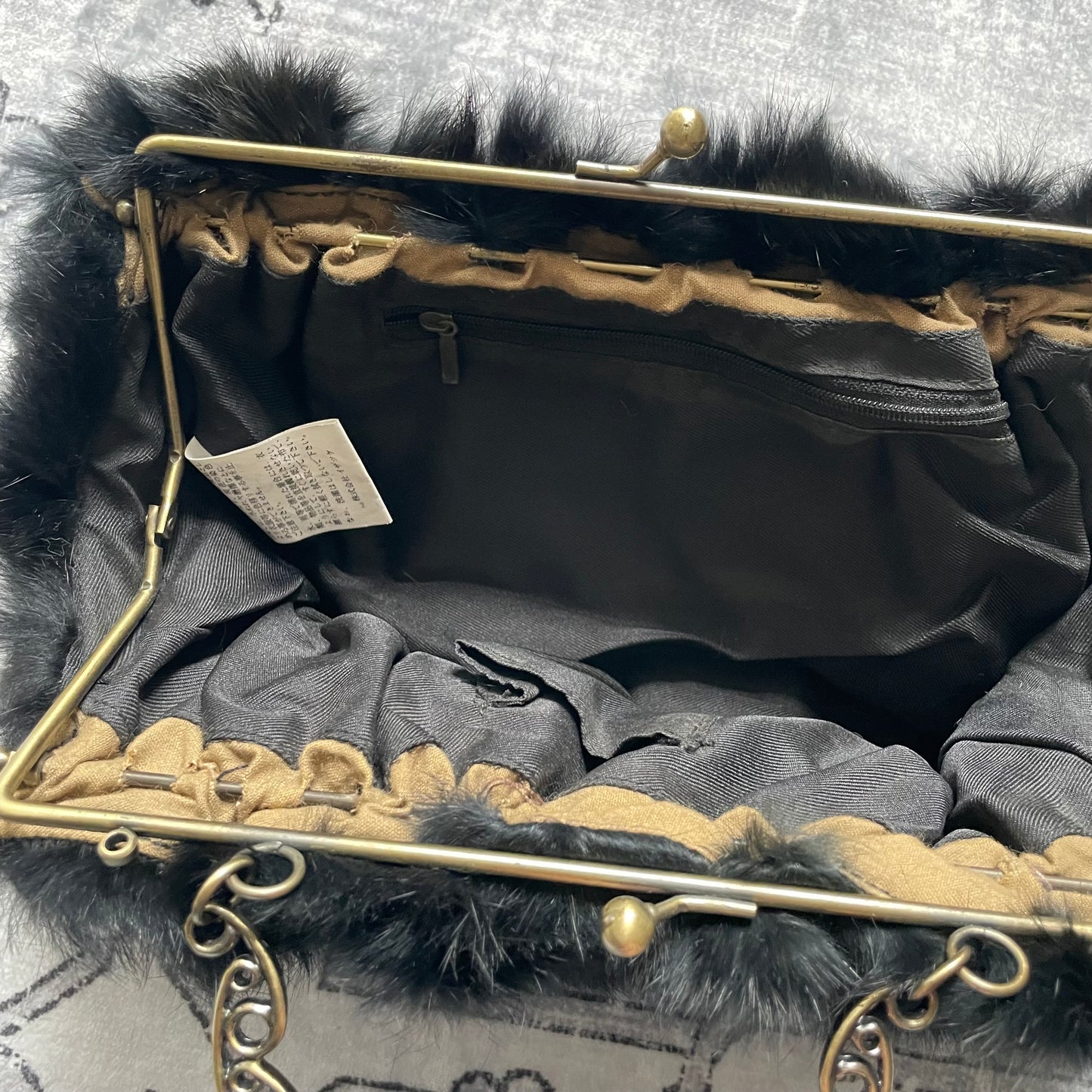 vintage black fluffy rabbit fur brassy ornamental handle clutch bag