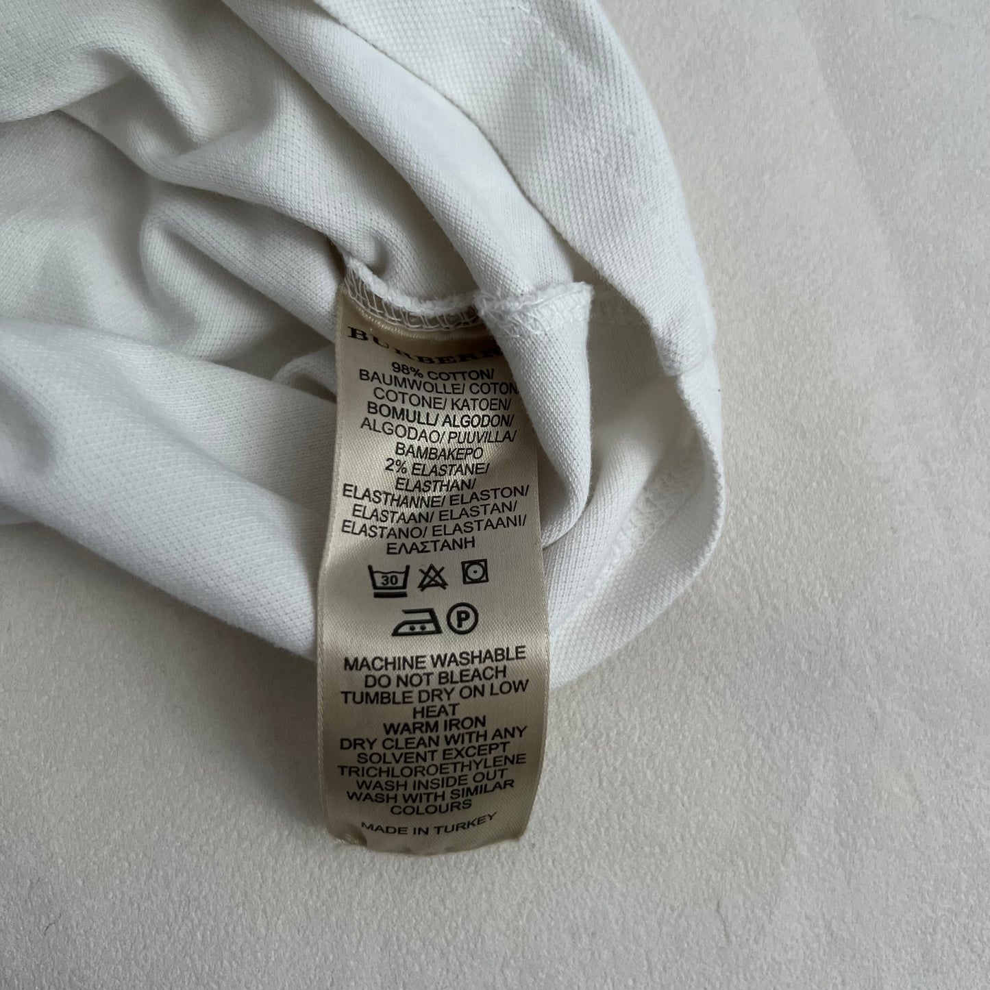 White Burberry Brit Ruched Puff Sleeve Fitted 1/4 Button Polo Top