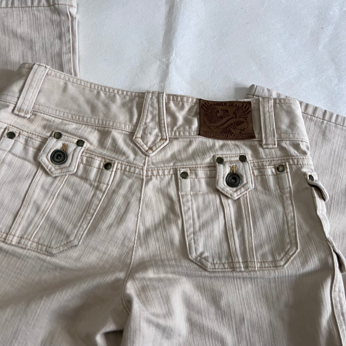 Fragile Ivory Beige Mid Rise Layered Pocket Straight Leg Denim Trousers