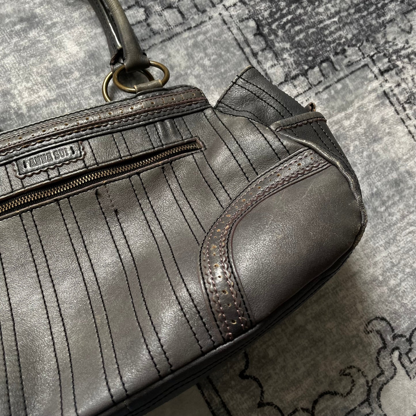 anna sui faded denim grey panelled shoulder bag with ribbon bow detail + brass hardware and butterfly charm