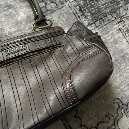 anna sui faded denim grey panelled shoulder bag with ribbon bow detail + brass hardware and butterfly charm