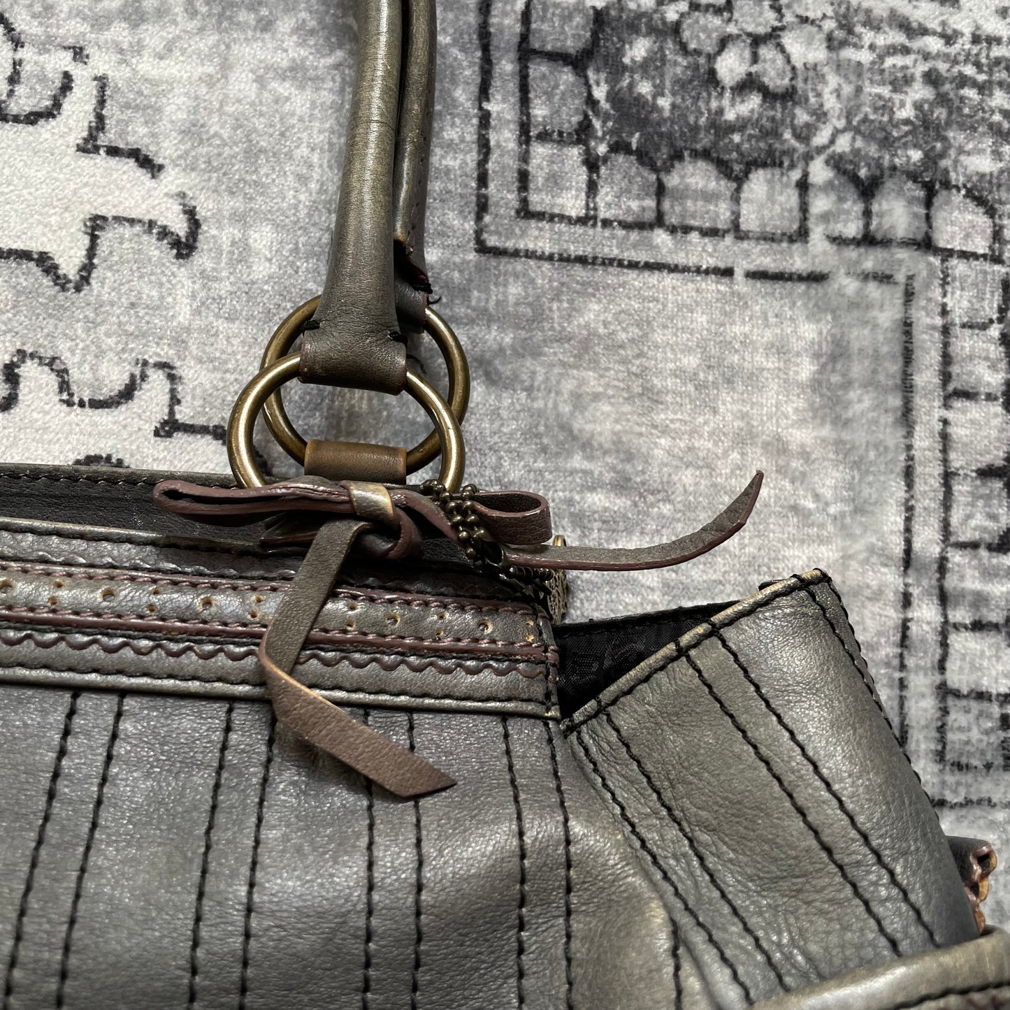 anna sui faded denim grey panelled shoulder bag with ribbon bow detail + brass hardware and butterfly charm