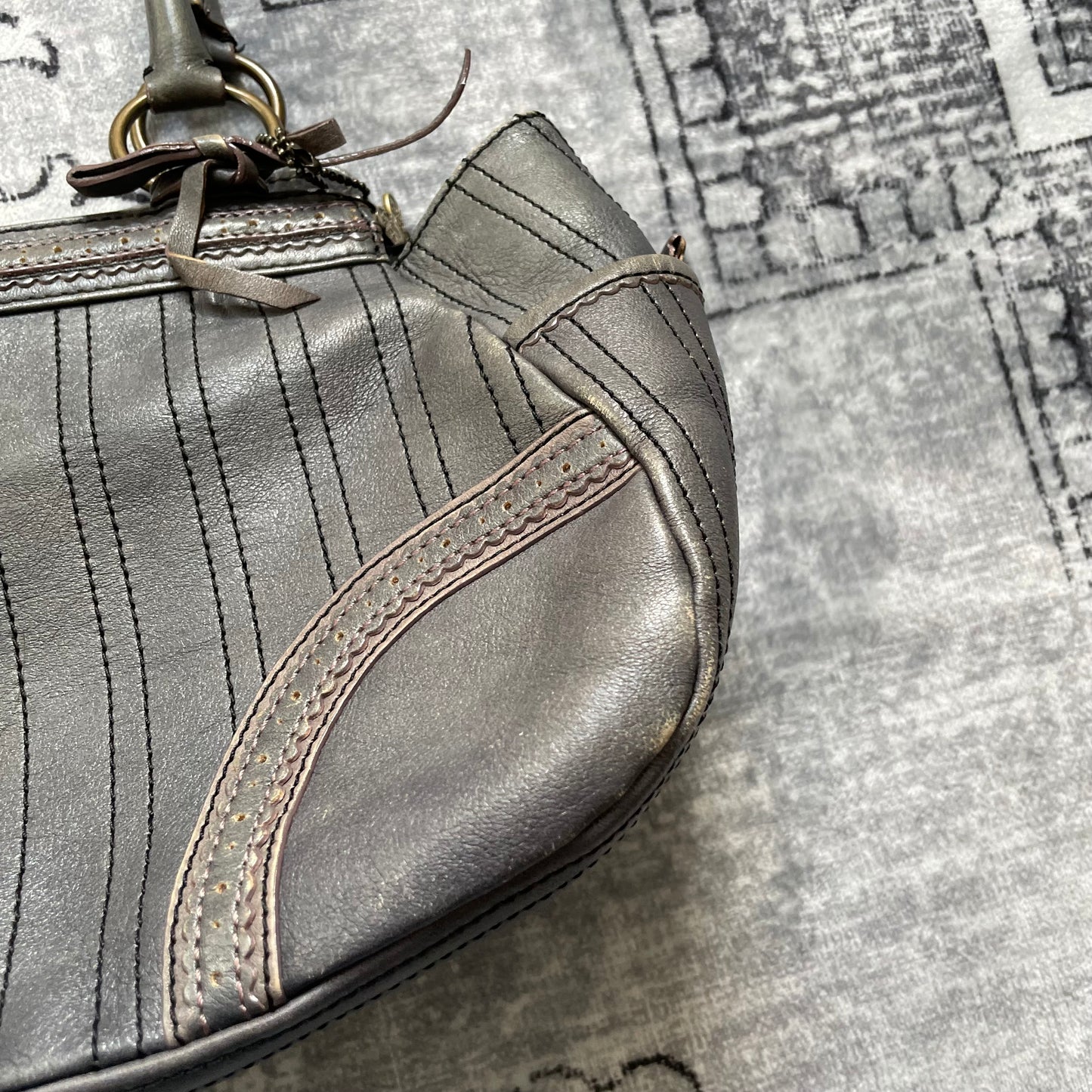 anna sui faded denim grey panelled shoulder bag with ribbon bow detail + brass hardware and butterfly charm