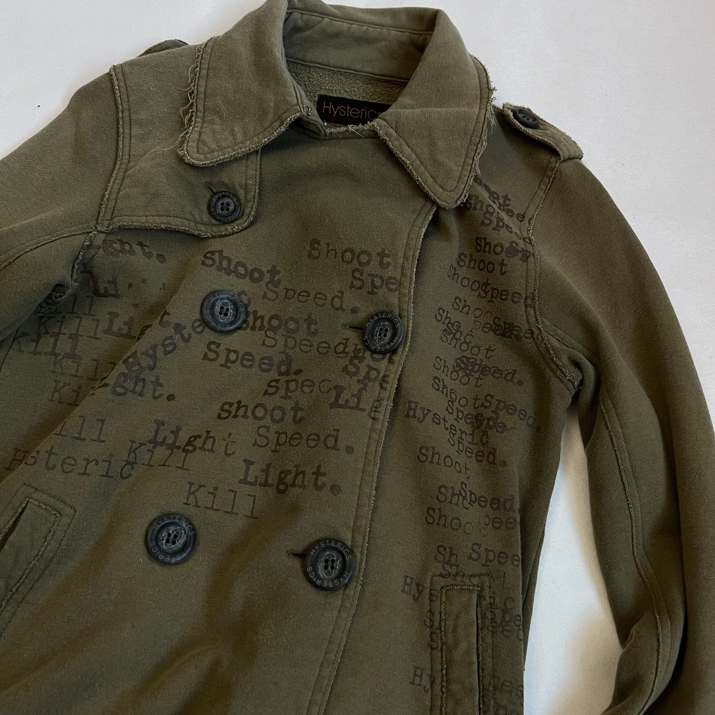 hysterics khaki corpcore asymmetric button faded text graphic collared jacket