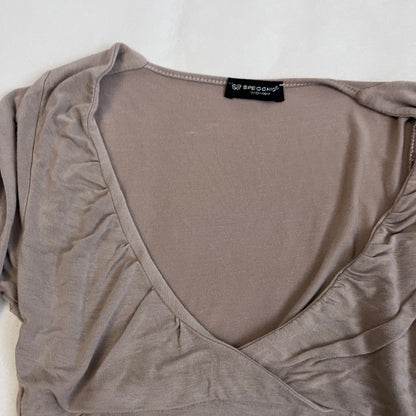 speccio beige balletcore wrap style asymmetric hem long sleeve shirt