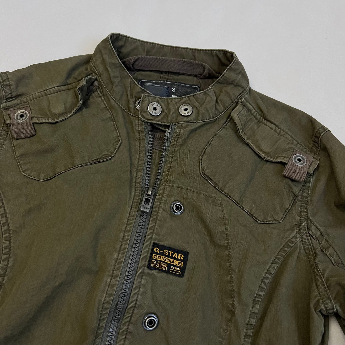 dark khaki g-star raw long sleeve utility style neck buckle jacket