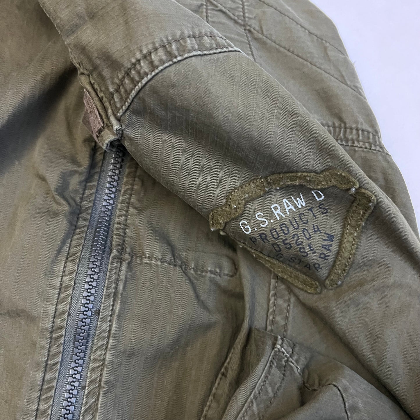 dark khaki g-star raw long sleeve utility style neck buckle jacket