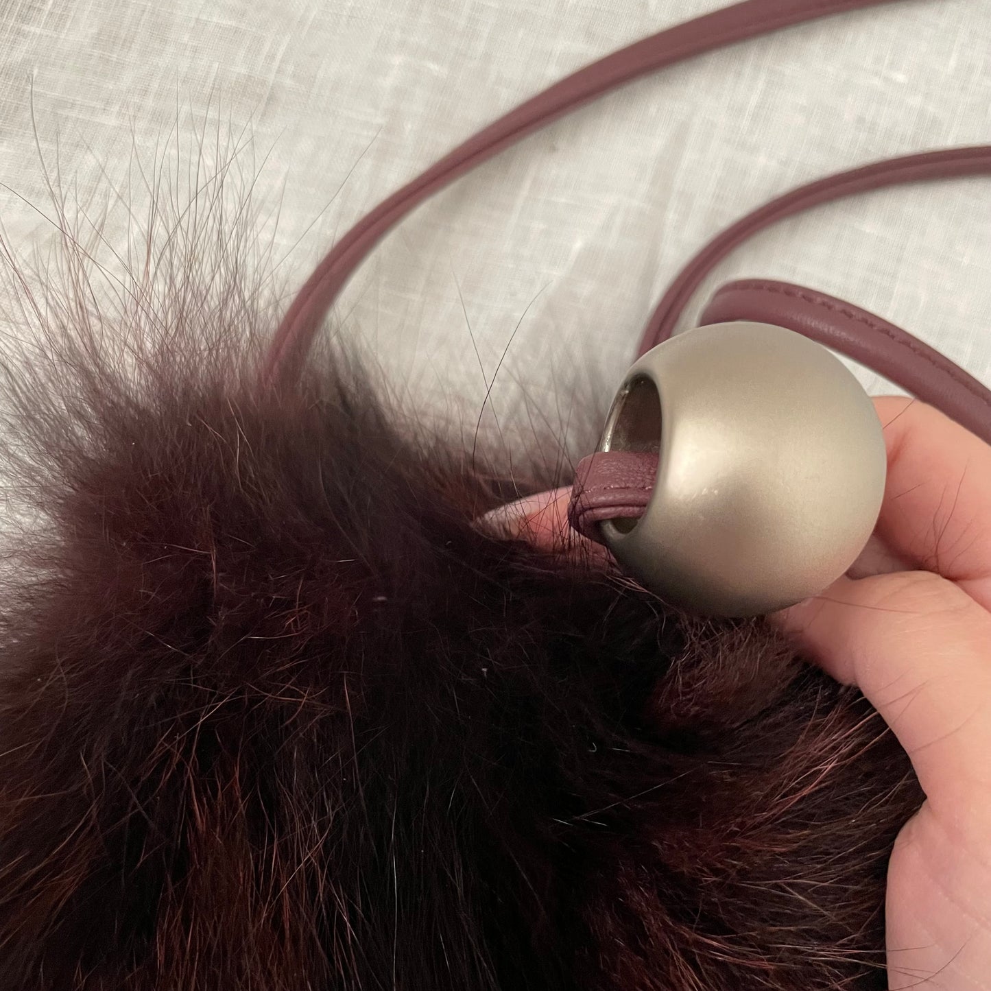 lanzetti bordeaux rouge fur x leather crossbody bag with silver bead detail