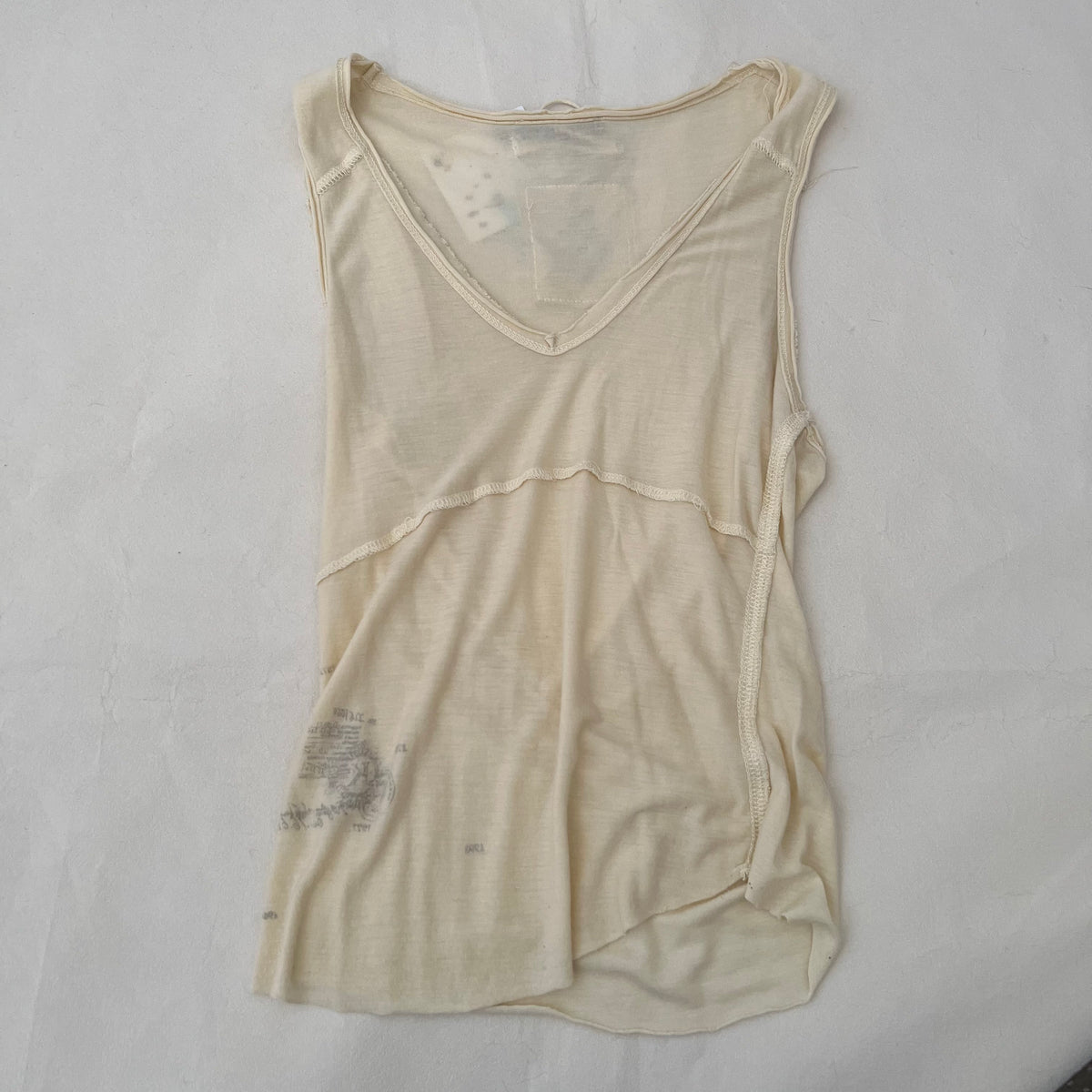 Cream V Neck Faded Graphic Vest