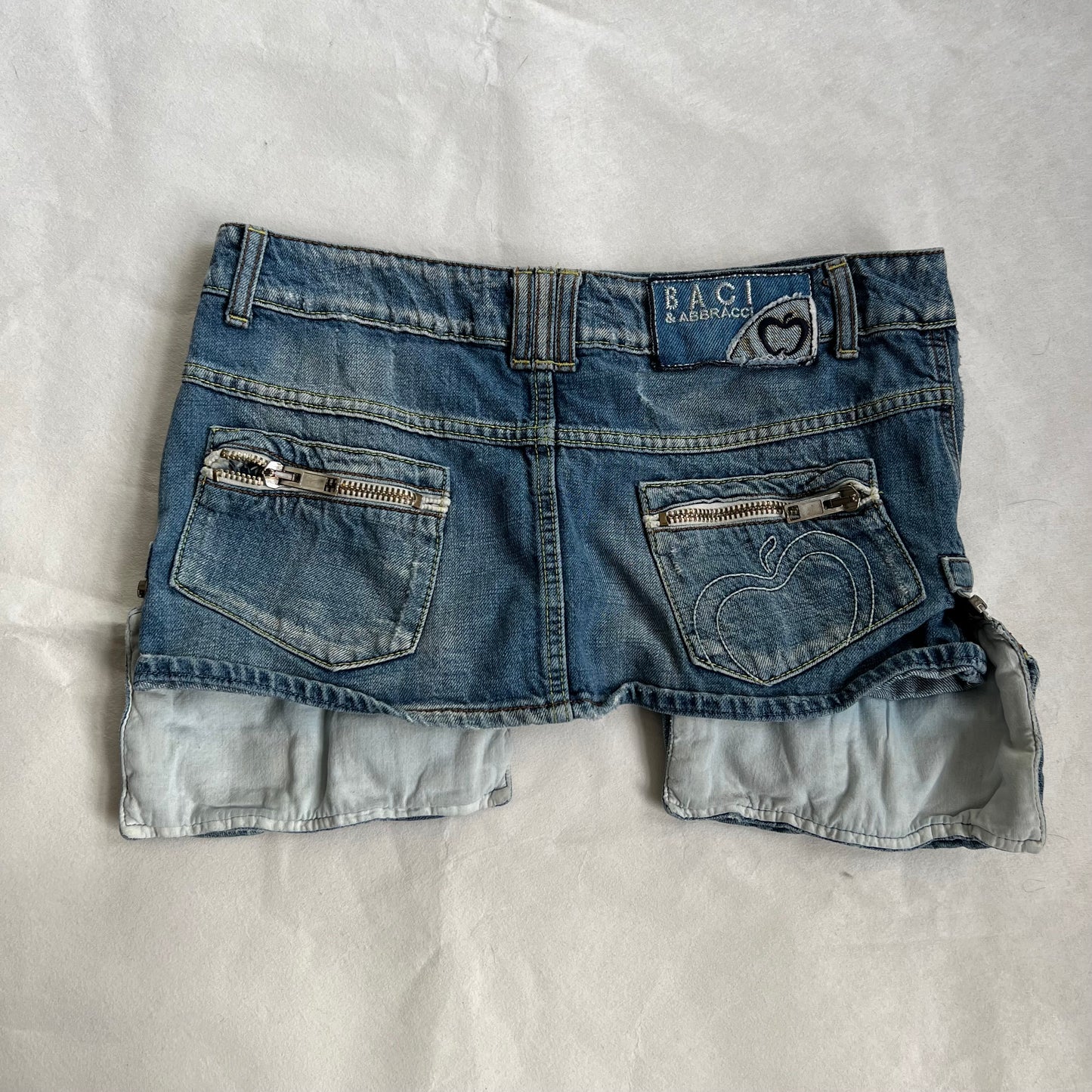 baci denim light wash utility deconstructed hanging zip pocket cargo denim mini skirt