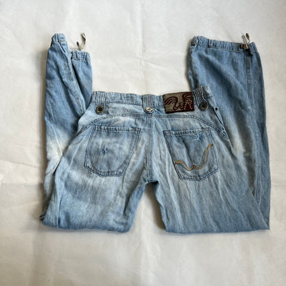 replay light wash denim baggy straight leg faux rip adjustable cinched hem jeans