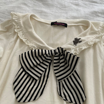 alonaquins preppy punk sailor off white puff sleeve balloon hem top with back detail and striped ribbon bow
