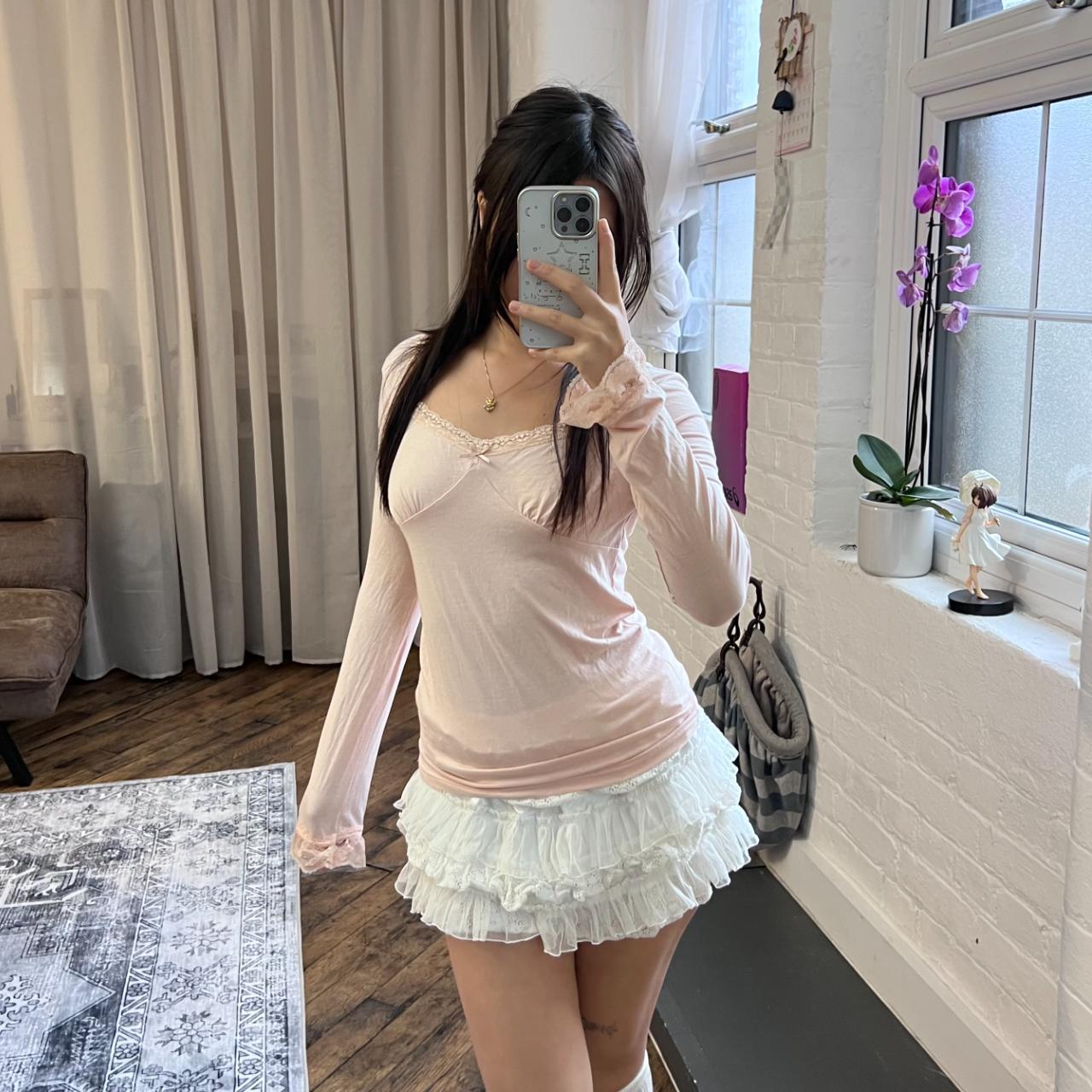 coquette angelic pink long sleeve liz lisa lacey square neck top with criss cross back detailing and frilly sleeve hem