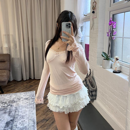 coquette angelic pink long sleeve liz lisa lacey square neck top with criss cross back detailing and frilly sleeve hem