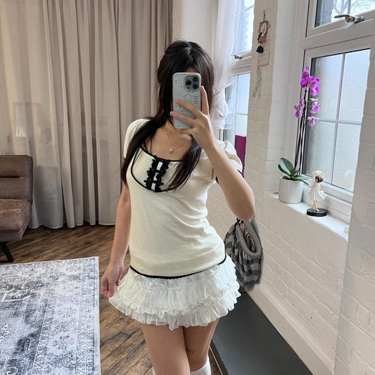 coquette preppy igni white black contrast accent short sleeve ruffle milkmaid knit