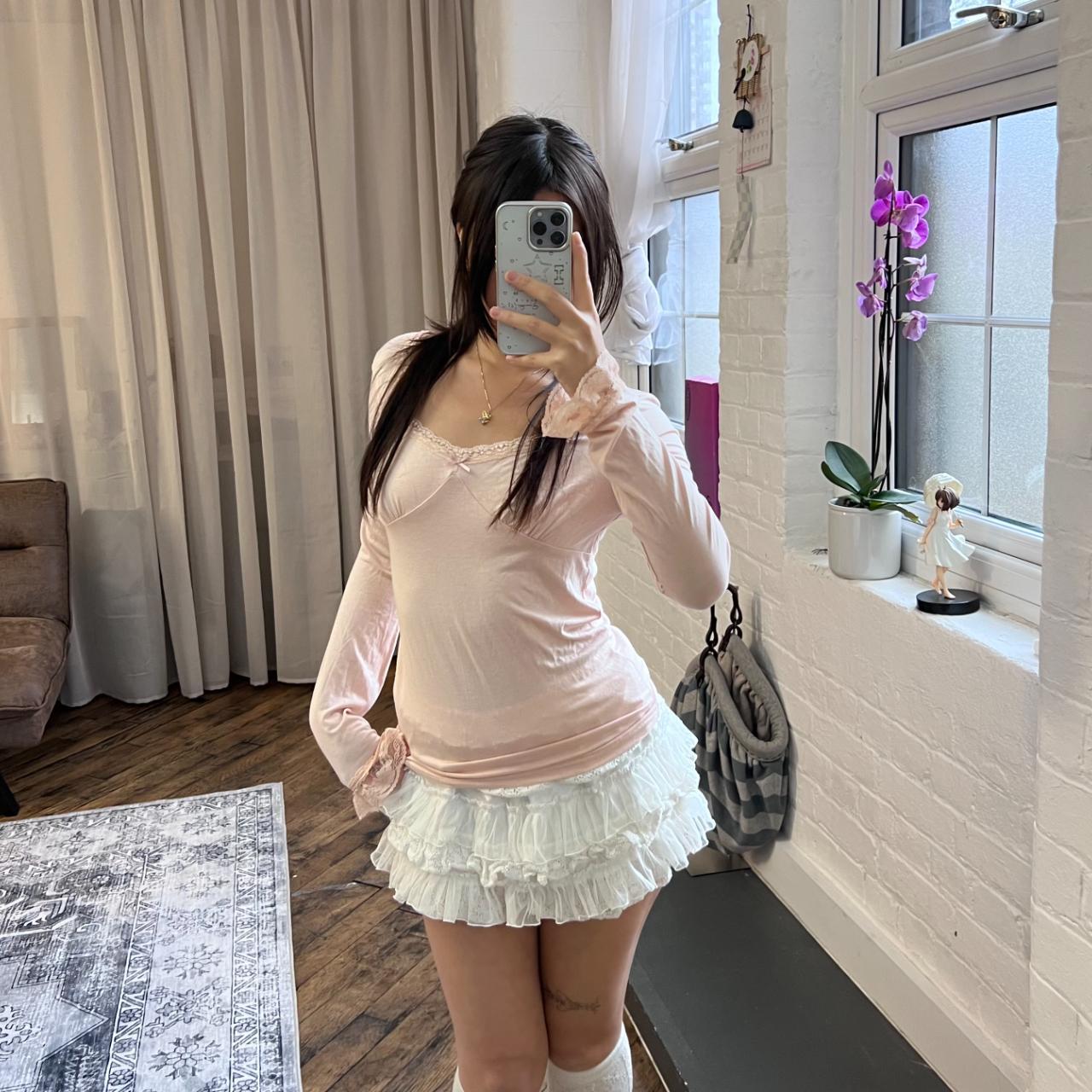 coquette angelic pink long sleeve liz lisa lacey square neck top with criss cross back detailing and frilly sleeve hem