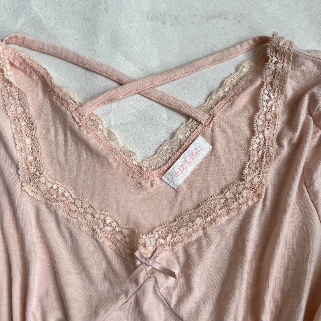 coquette angelic pink long sleeve liz lisa lacey square neck top with criss cross back detailing and frilly sleeve hem